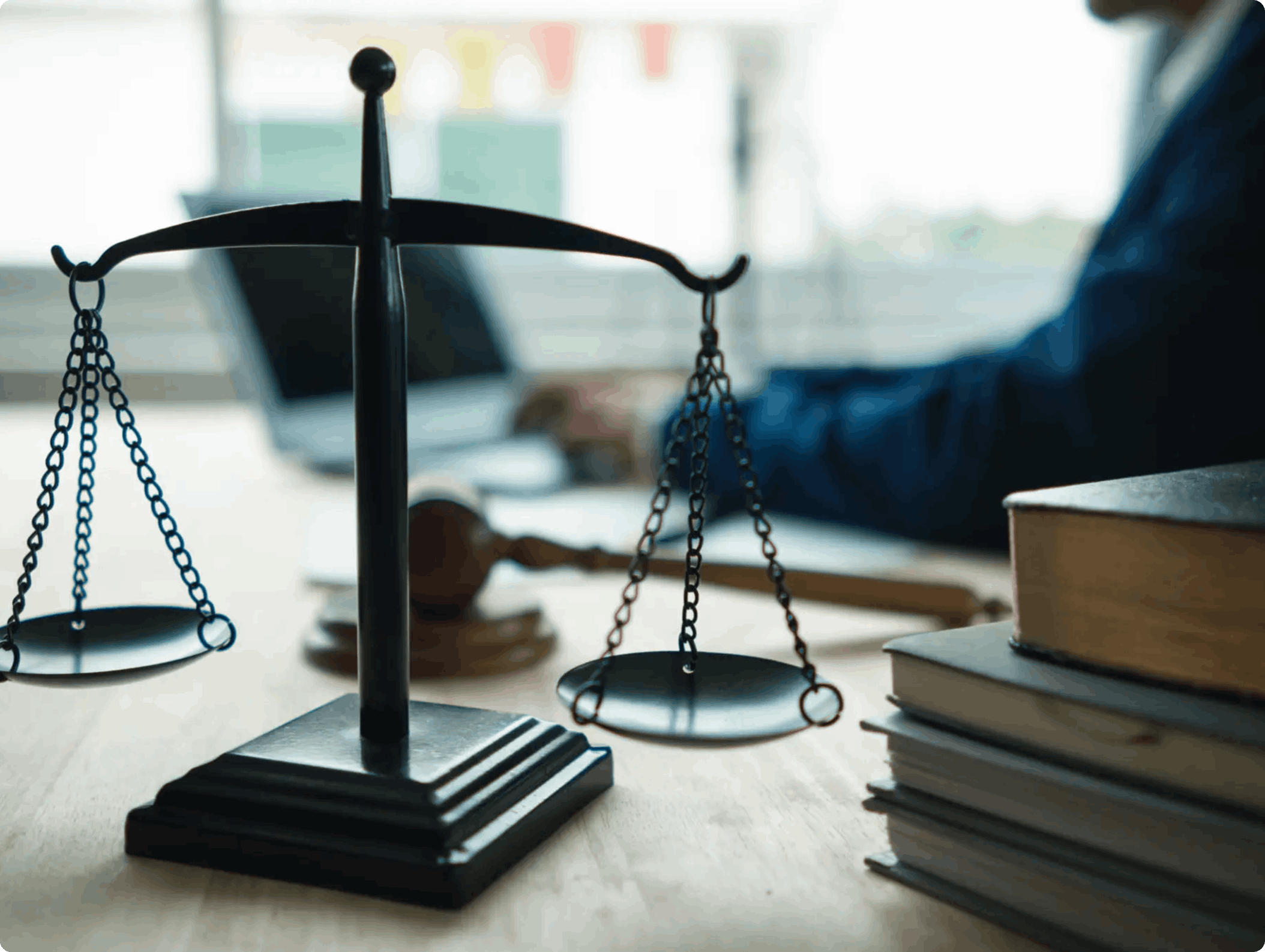 A table with books and a scale on it